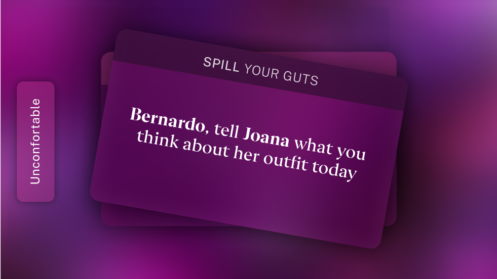 A high-fidelity Anathema screen displaying the second half of theRisk or Spill game in the second player phone. A card with the title Spill your guts and the prompt Bernardo, tell Joana what you think about her outfit today.